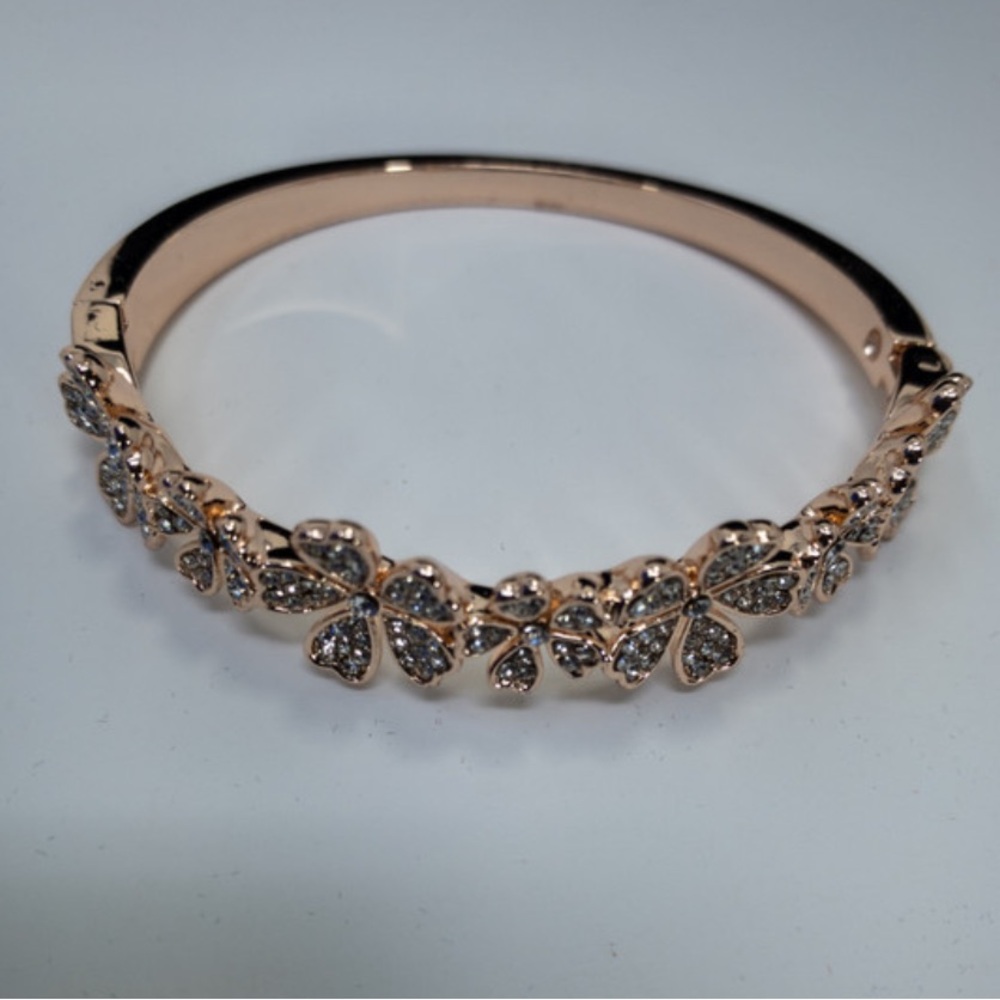 Rose gold pave crystal daisy bracelet with hinge clasp